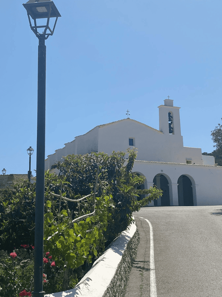 Historic church in a scenic coastal village perfect for travel and exploration.