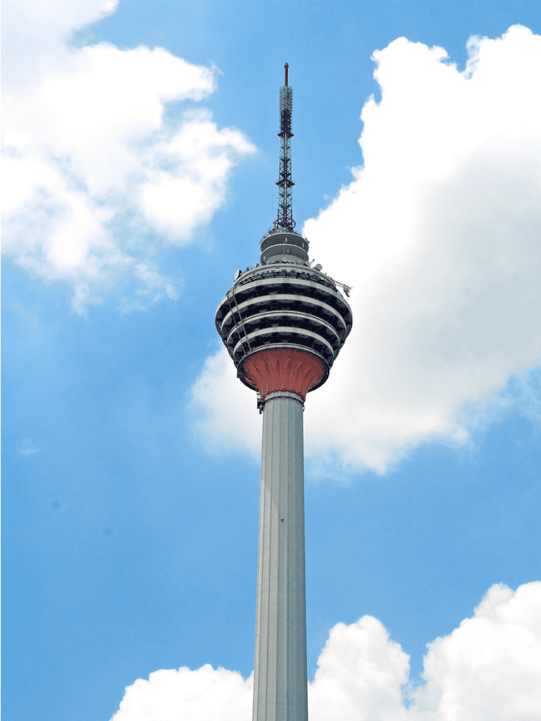 Tall communication tower in Kuala Lumpur, Malaysia for broadcasting and telecommunications.