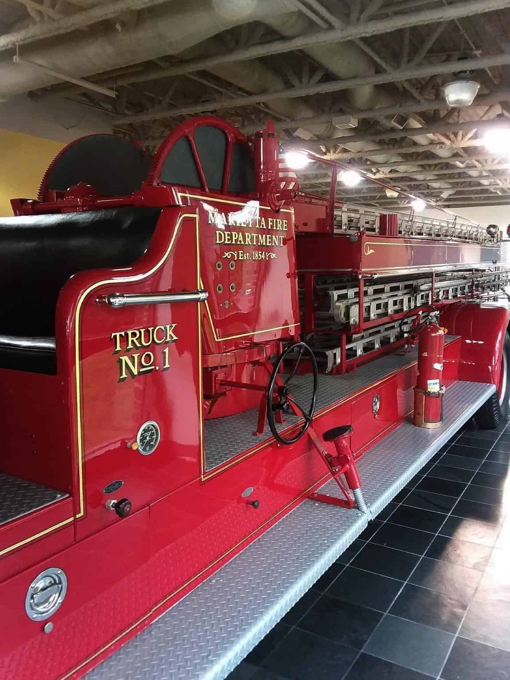 Red fire truck from the Murrieta Fire Department, vintage firefighting vehicle with nostalgic design.
