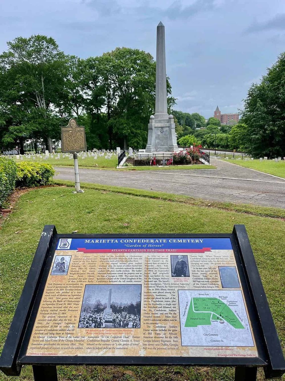 Confederate Cemetery Memorial at Marietta Confederate Cemetery, Georgia, with historic grave markers and information plaque.