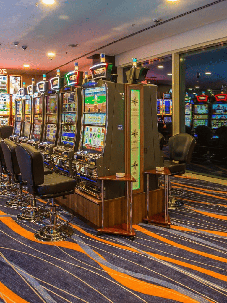 Lucky casino slot machines with modern gaming technology in a stylish casino interior.