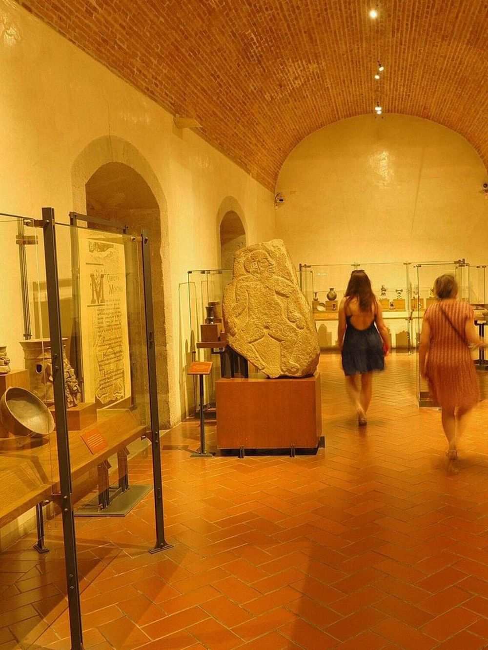 Ancient artifacts displayed in a museum exhibit at QuestForDirections, highlighting historical discoveries and cultural heritage.