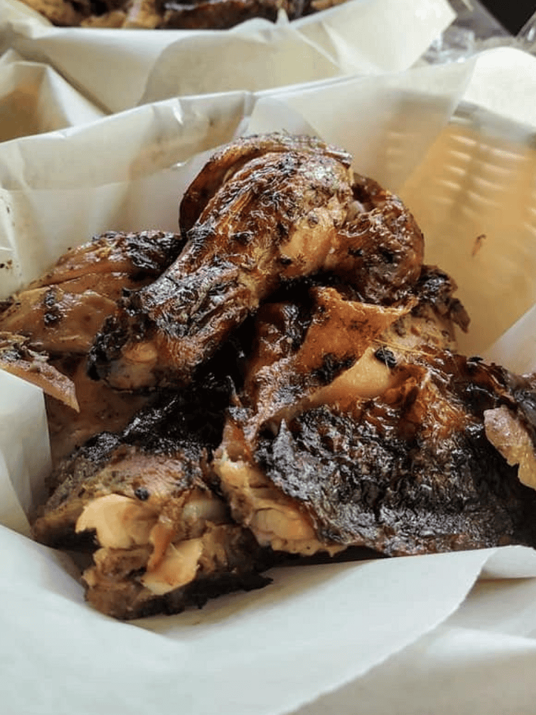 Juicy grilled chicken thighs with crispy charred skin, served fresh and flavorful.