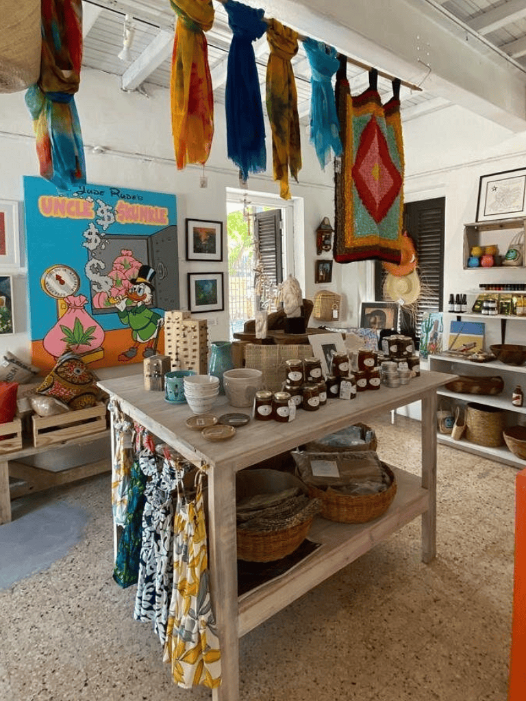 Colorful boutique with artisan home decor, handmade jewelry, and vibrant textiles from QuestForDirections.