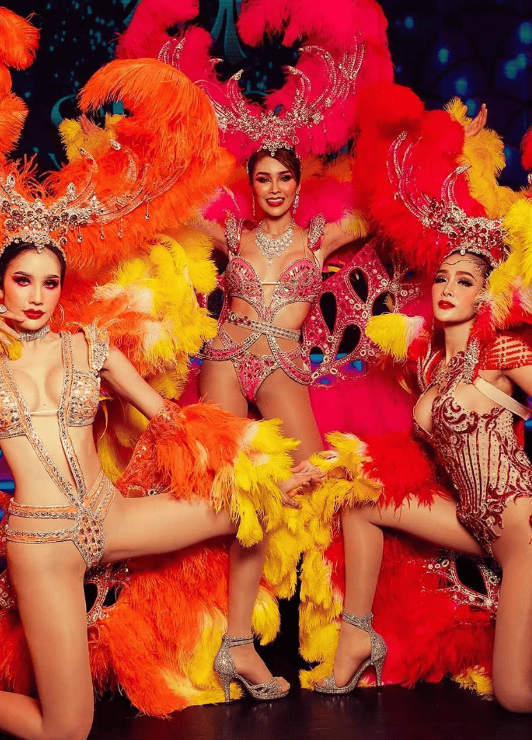 Vibrant carnival costumes with feathers and intricate beadwork, showcasing lively dance performances.