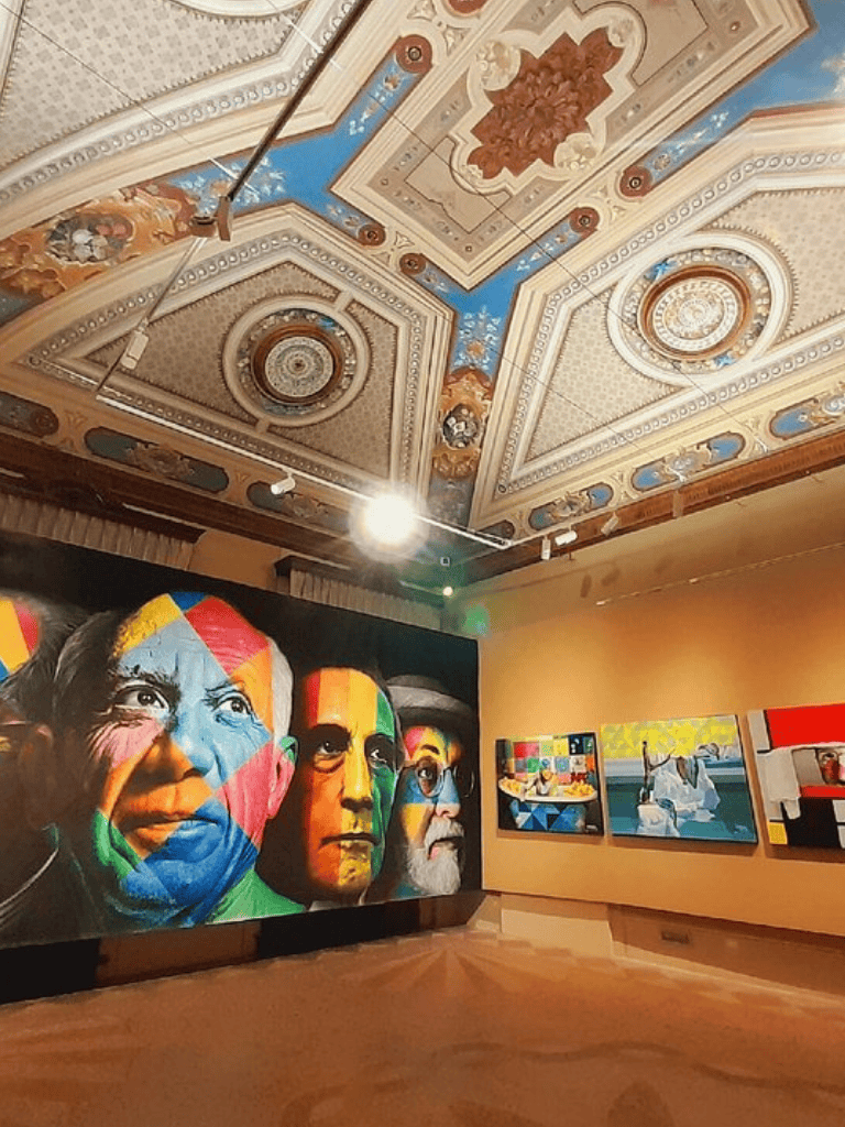 - Vibrant mural of Indigenous leaders at QuestForDirections Canadian art exhibit.