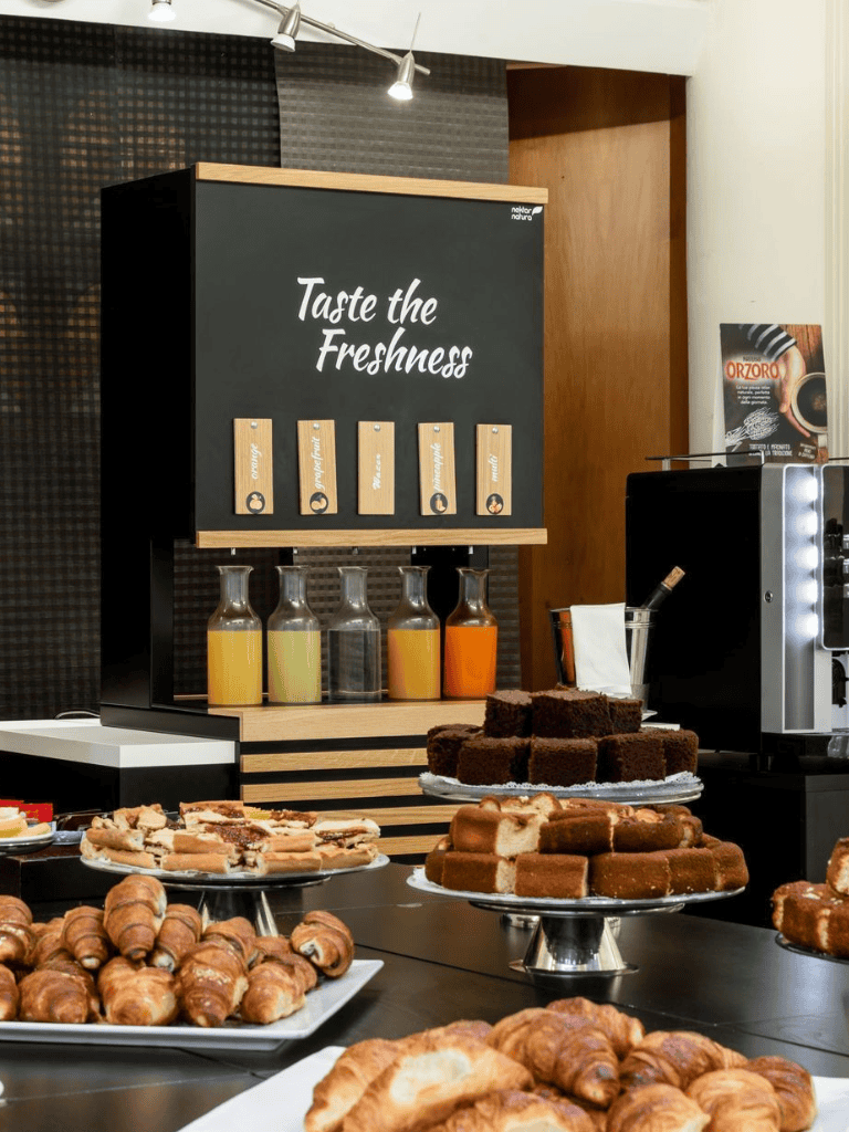 Fresh coffee and pastries display at QuestForDirections, perfect for morning meetings or casual breaks.