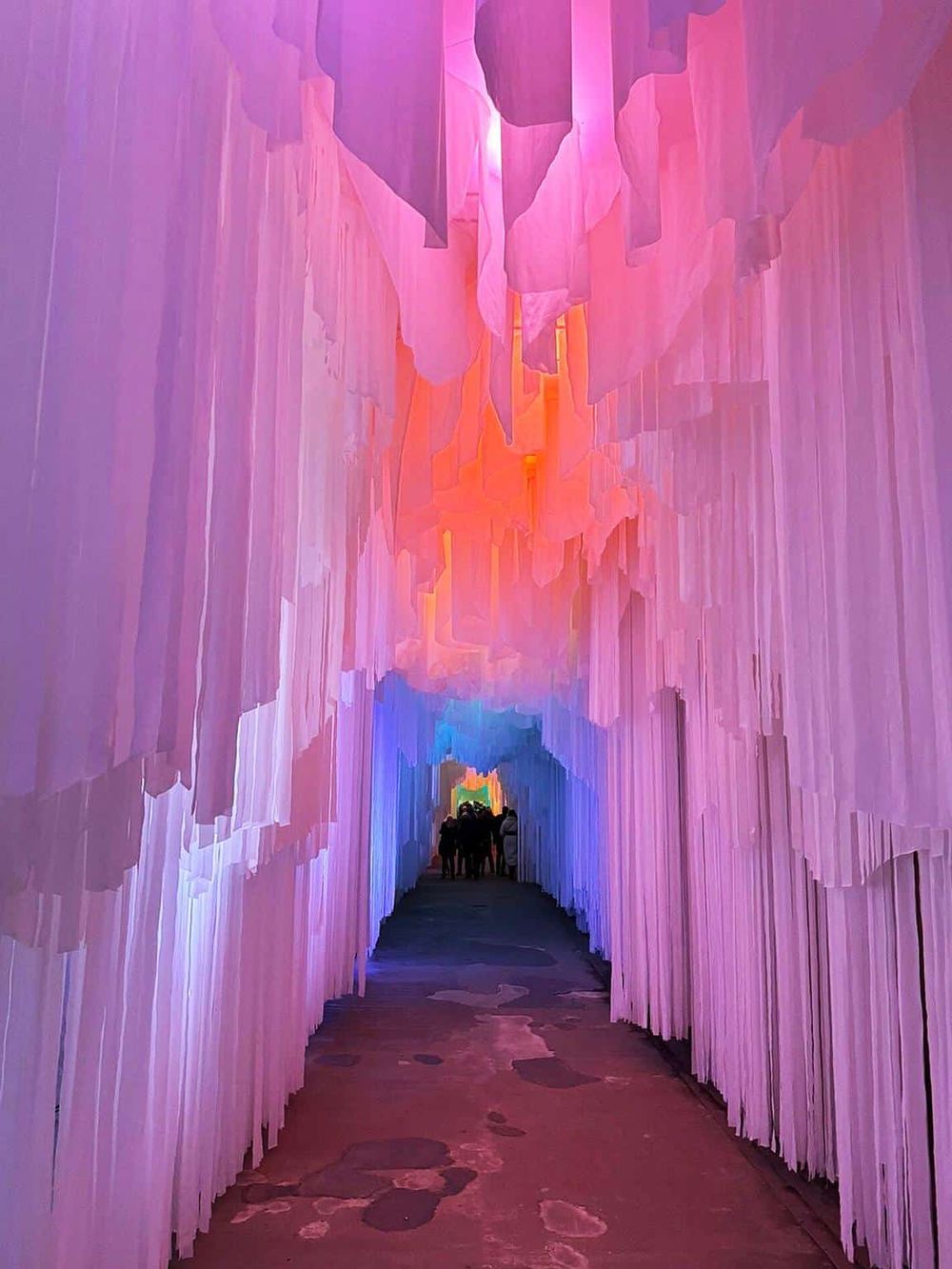 Vibrant, colorful art installation with pink, purple, orange, and blue hues, ideal for art lovers and visitors seeking unique experiences.