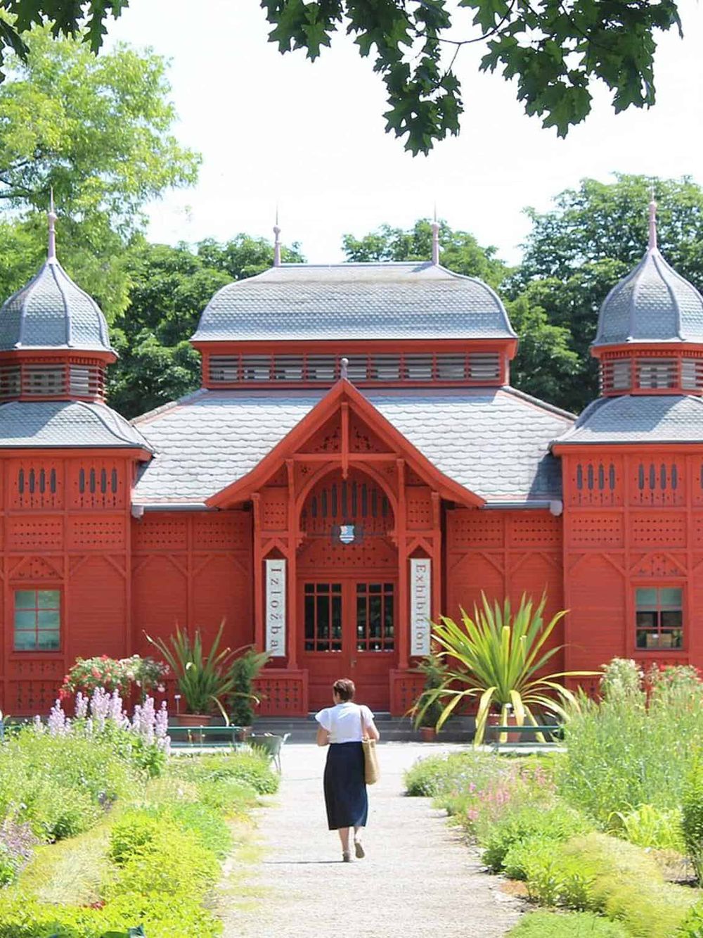 Colorful historic building at the Quest for Directions garden exhibit.