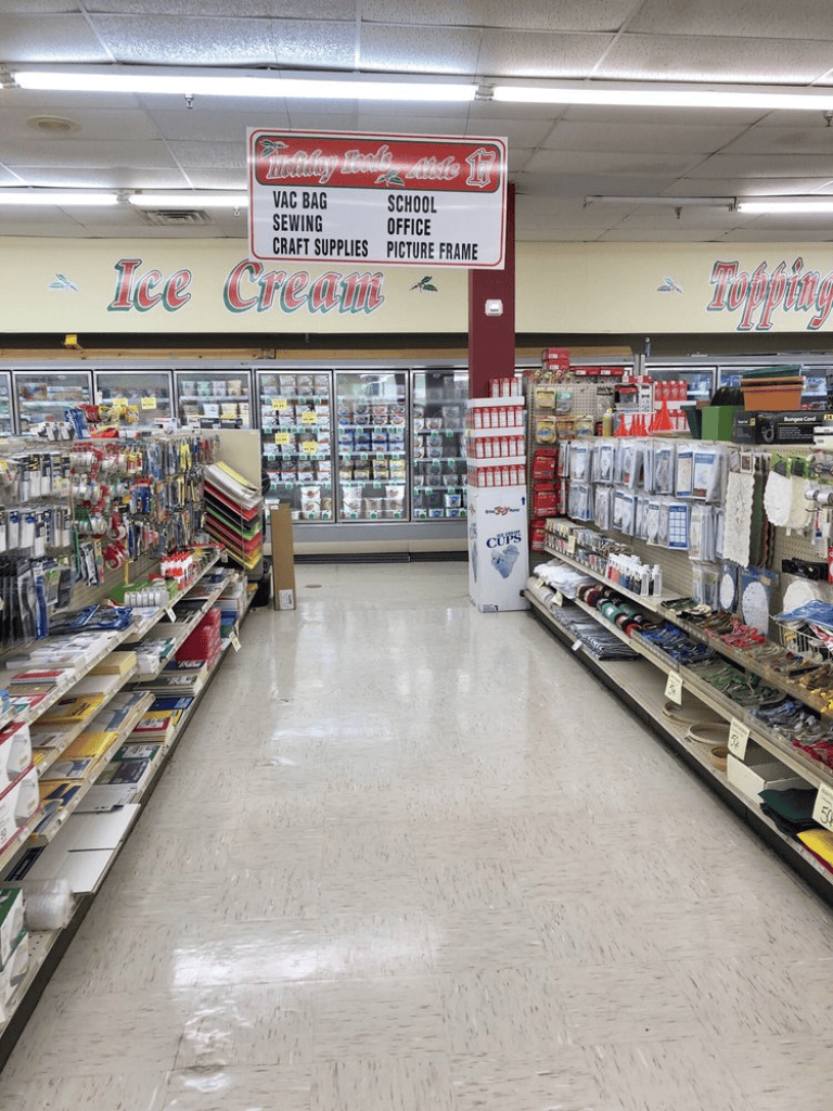 Vacuum bags, sewing supplies, craft materials in a convenience store aisle at QuestForDirections.