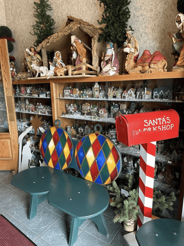 Christmas nativity scene figurines and village displays with festive decorations at QuestForDirections.