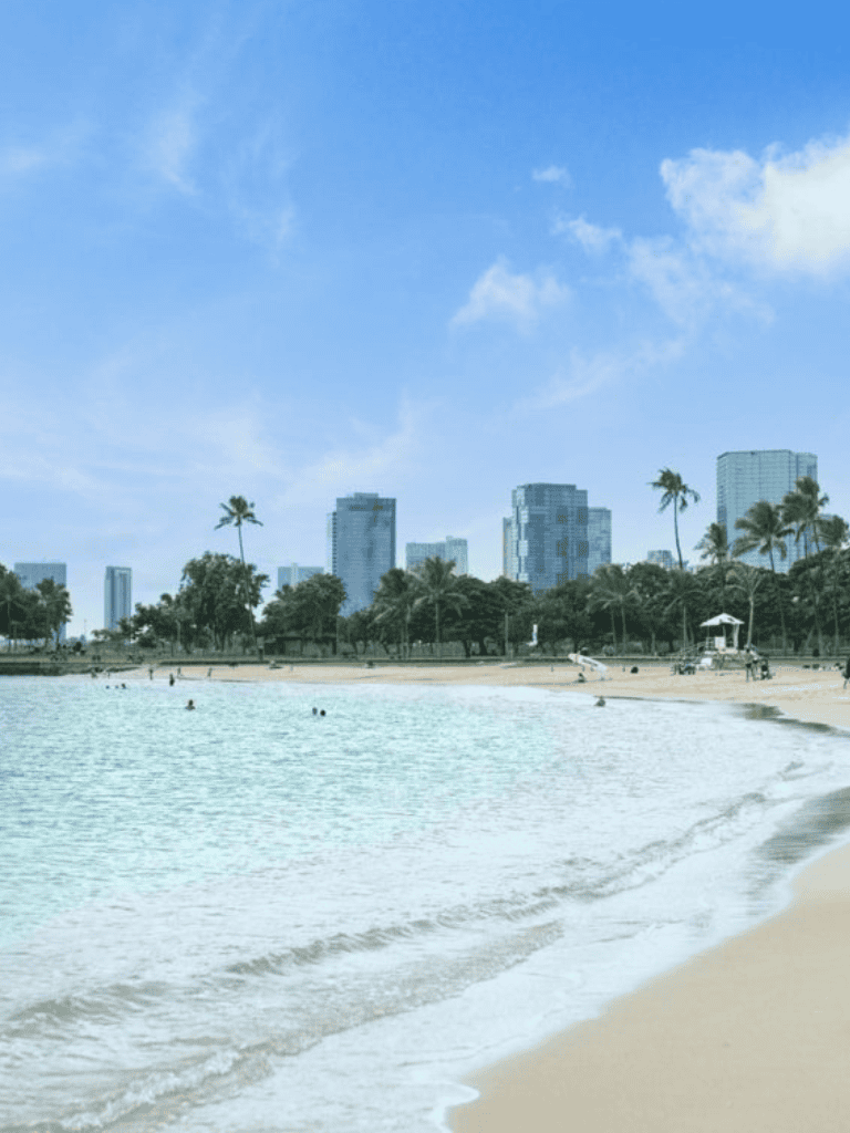 Vibrant city skyline with beach and palm trees for travel and exploration in Miami.
