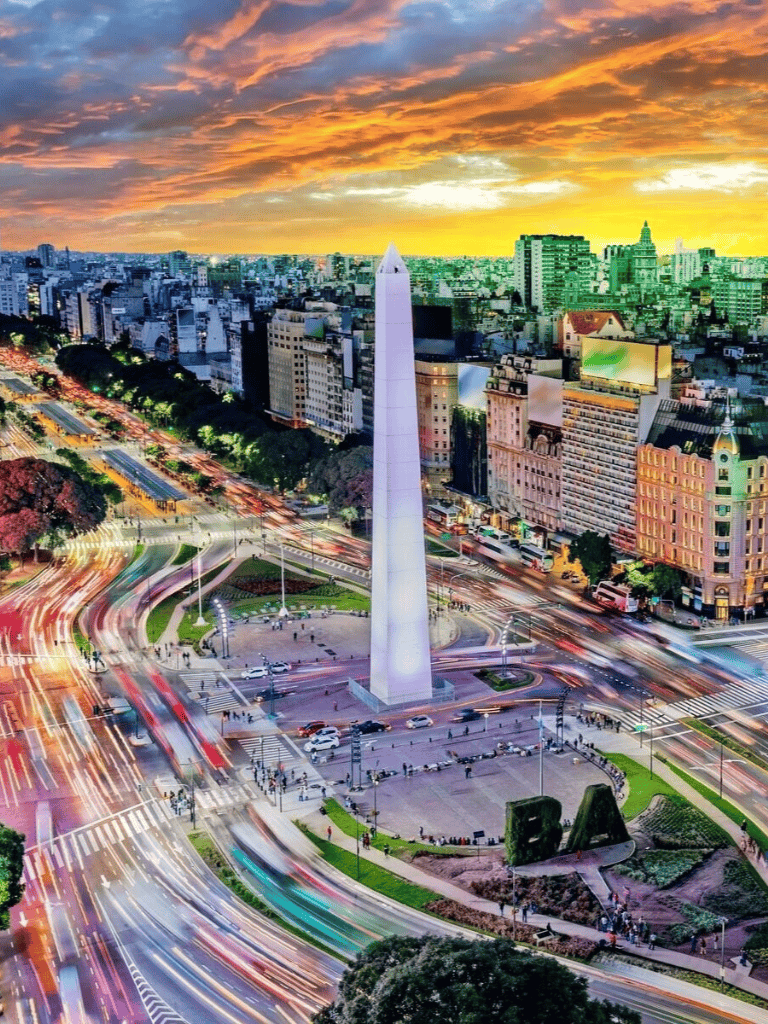 Iconic Washington Monument at sunset in downtown cityscape.