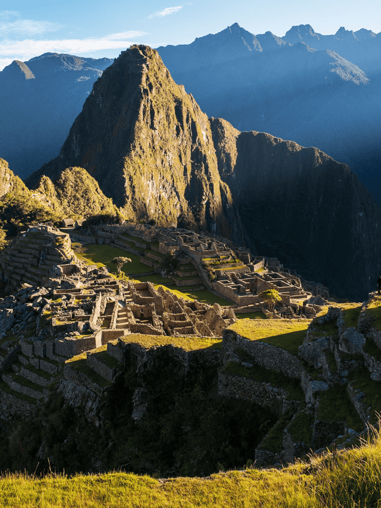 Ancient Machu Picchu ruins with lush Andes mountains in Peru, a top travel destination.