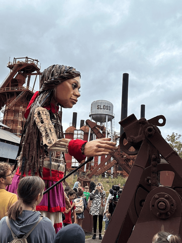 Larger-than-life mechanical sculpture at Quest for Directions, inspiring exploration and discovery.