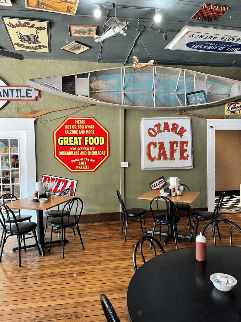 Vintage interior of Ozark Cafe with boating memorabilia and retro decor, creating a nostalgic dining experience.