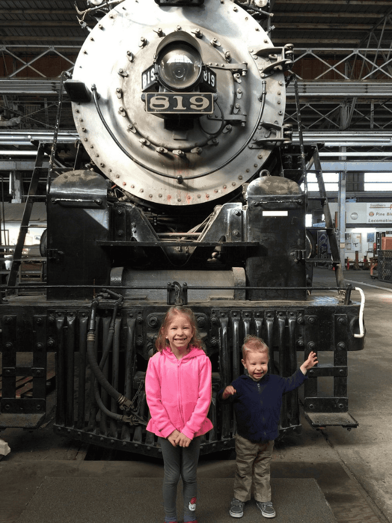 Classic steam locomotive exhibit at Quest for Directions museum.