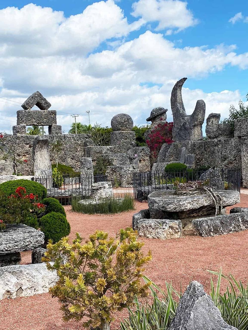 Ancient stone sculptures and gardens at Quest for Directions outdoor attraction, perfect for cultural exploration and sightseeing.