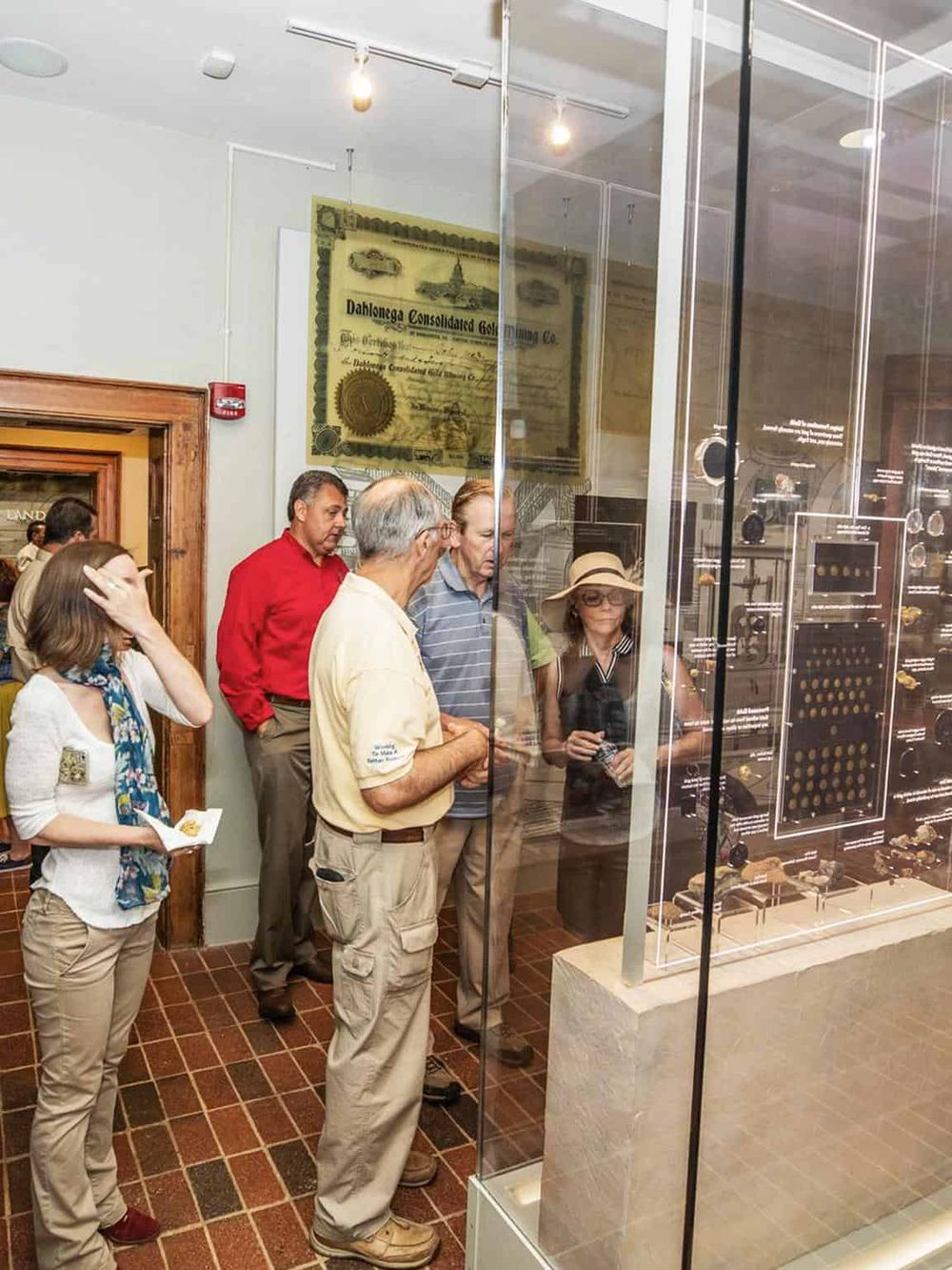 Vintage coin collection exhibit at QuestForDirections museum showcasing numismatic history and rare coins.