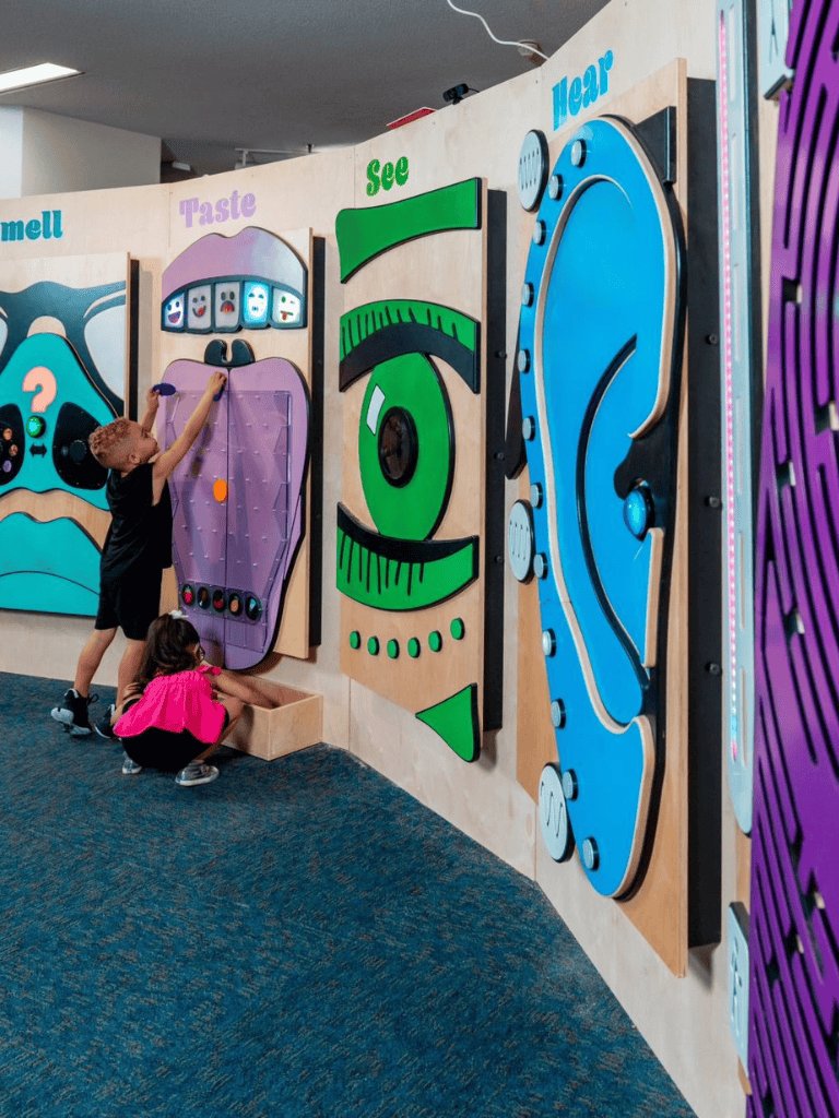 Interactive sensory wall for children at QuestForDirections learning center.