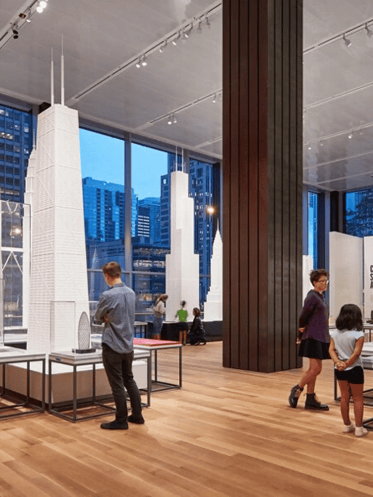 Modern architecture and urban skyline exhibits at QuestForDirections exhibit.