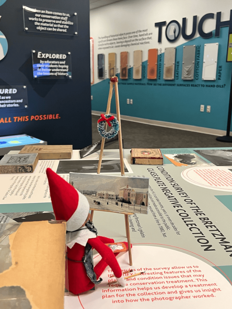 Exploration of conservation history and cultural artifacts at QuestForDirections exhibit.