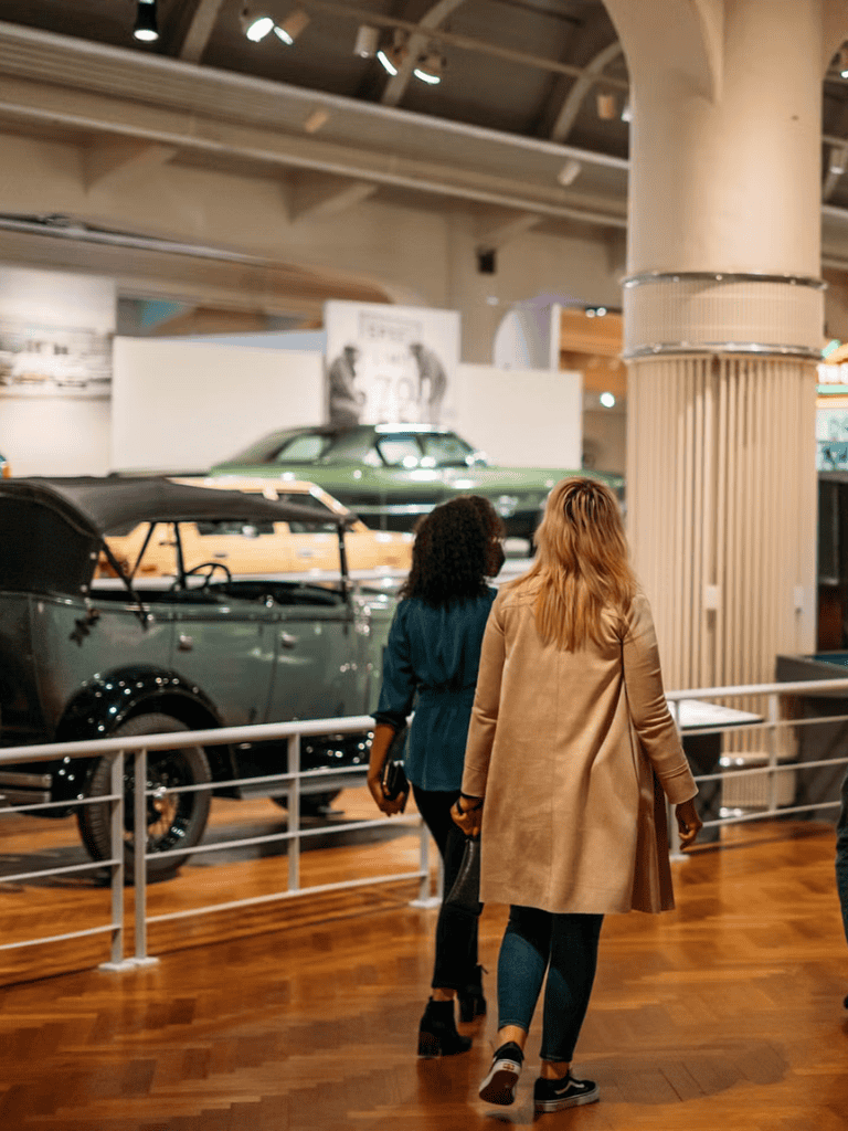 Classic vintage cars exhibit at QuestForDirections museum, showcasing automotive history and preservation.