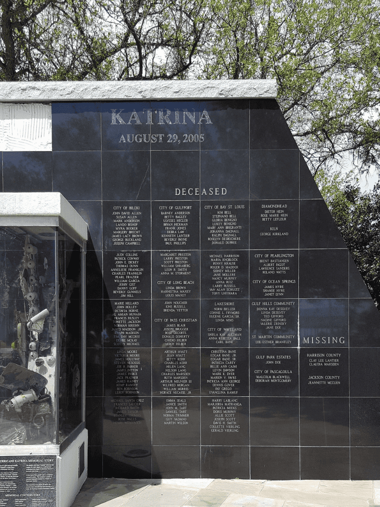 Memorial wall honoring Katrina victims, with engraved names and dates, at QuestForDirections.