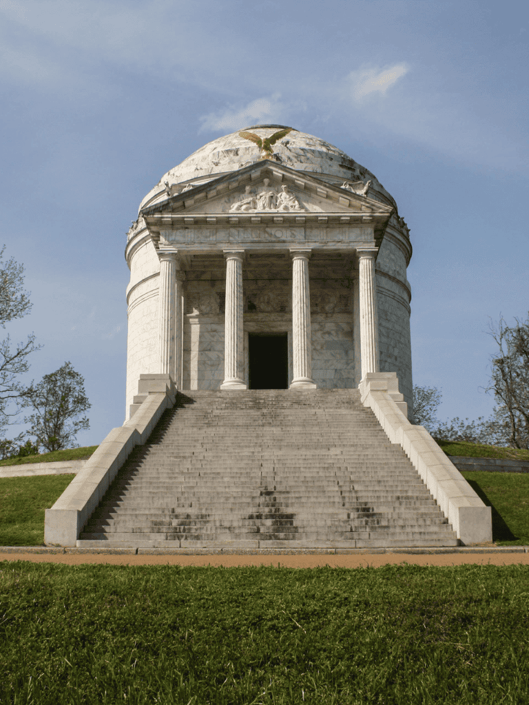 Ancient marble temple on hilltop with stairs and blue sky, historical monument, architecture, landmarks, tourism destination.