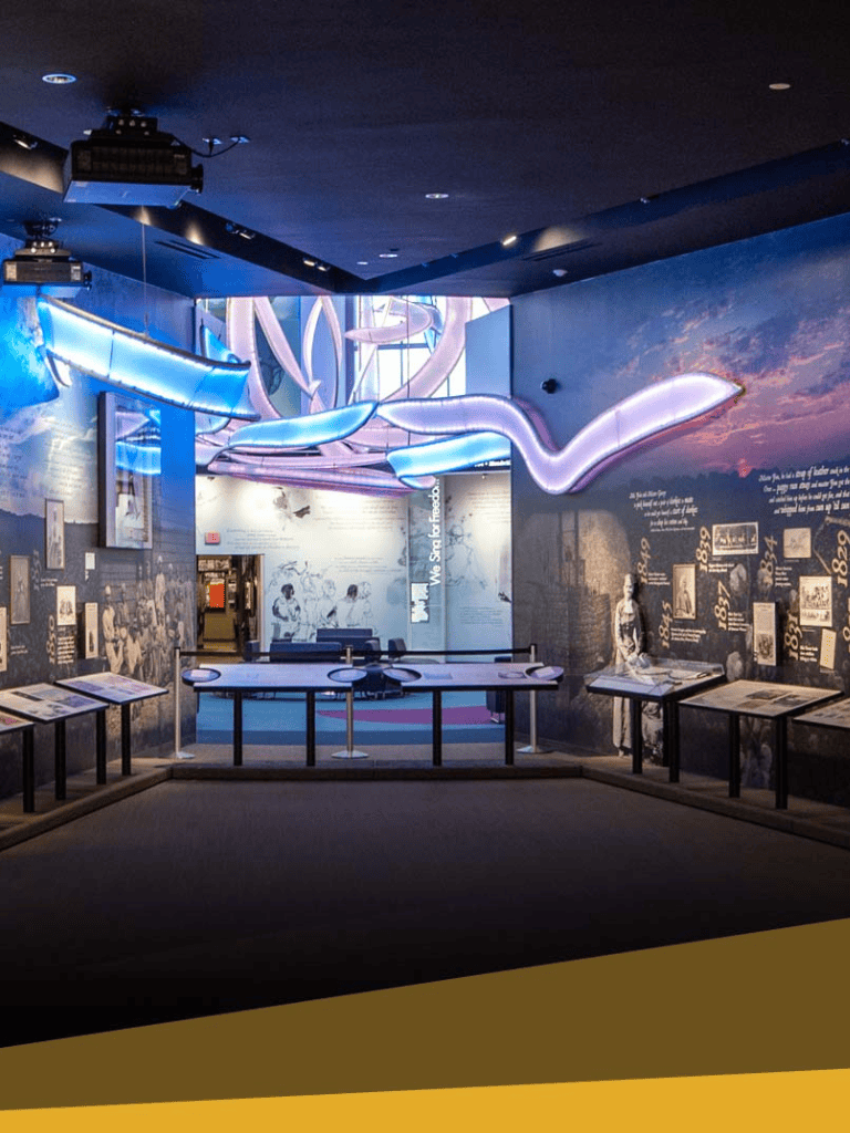 Vivid museum exhibit with interactive displays and historical timeline, emphasizing exploration and learning experiences.
