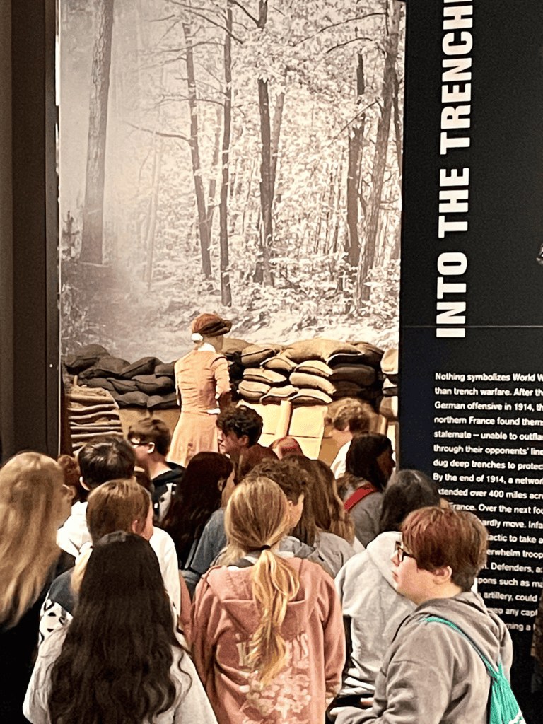 Trench warfare exhibit at QuestForDirections museum, teaching World War I history to visitors.