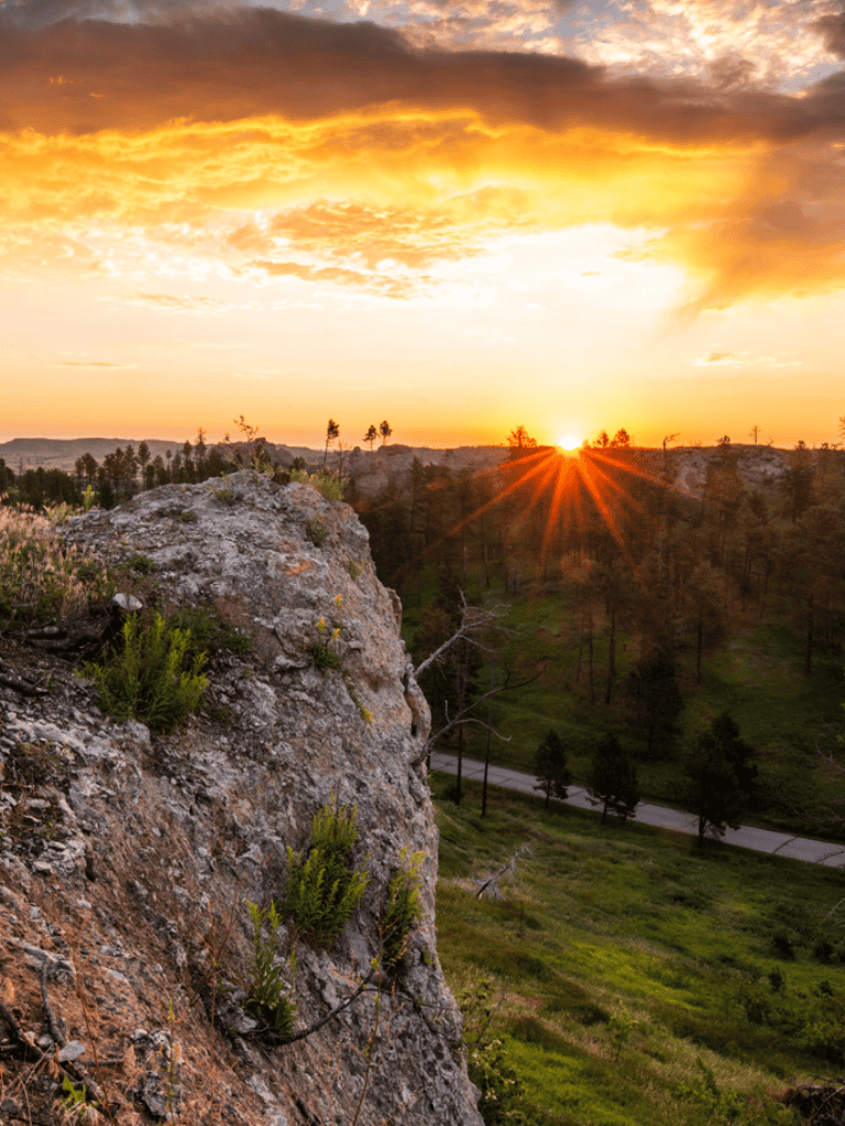 Stunning sunset over the Rocky Mountains at QuestForDirections adventure site.