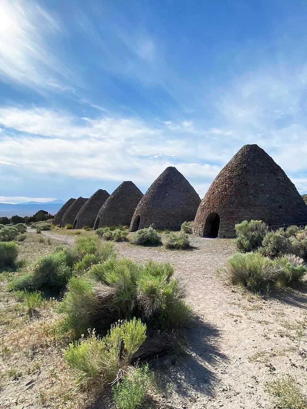 Ancient Indian Ancestral Dwellings in New Mexico - Crafted from volcanic rock, these historic beehive-shaped structures are a testament to indigenous heritage.