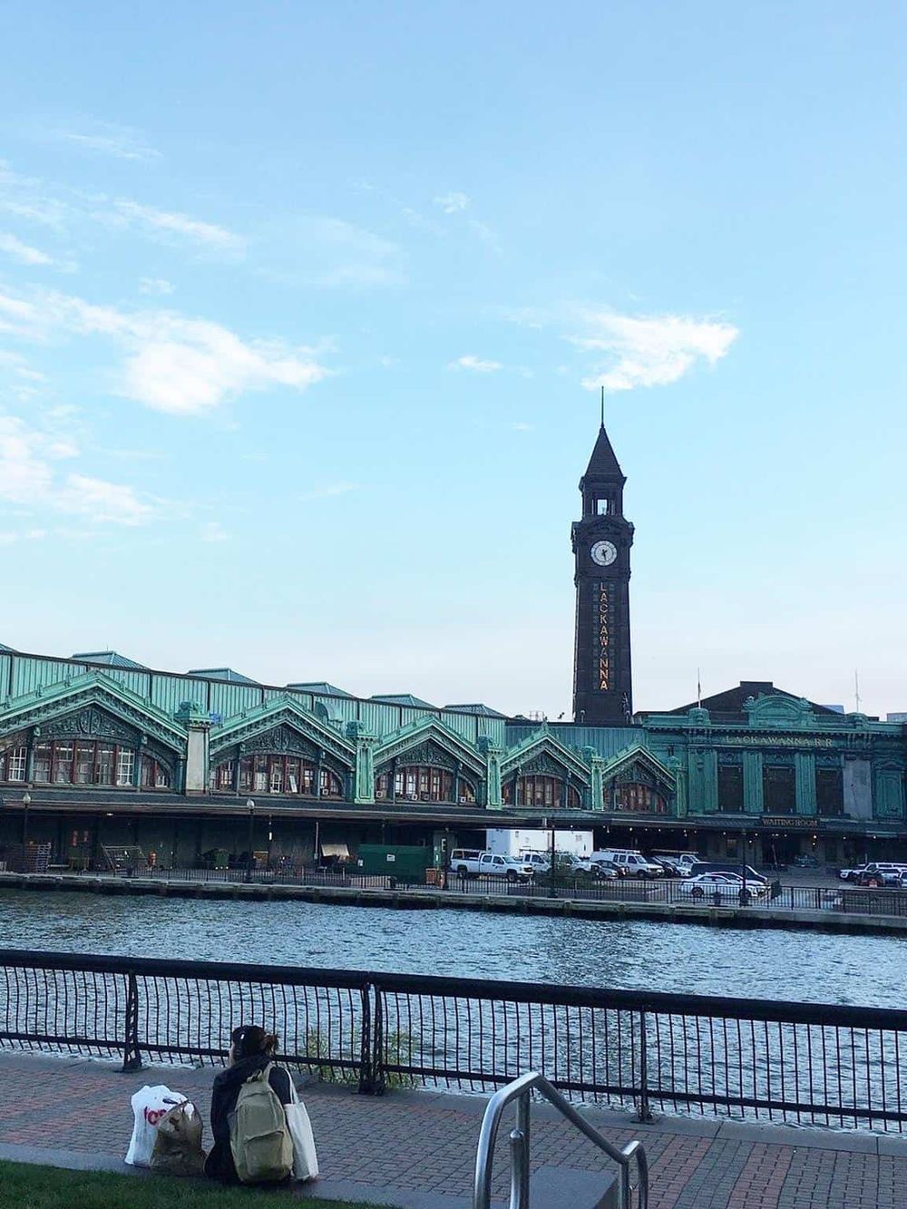 Historic Fisherman's Wharf waterfront in Seattle, featuring the iconic clock tower and vibrant harbor scene.