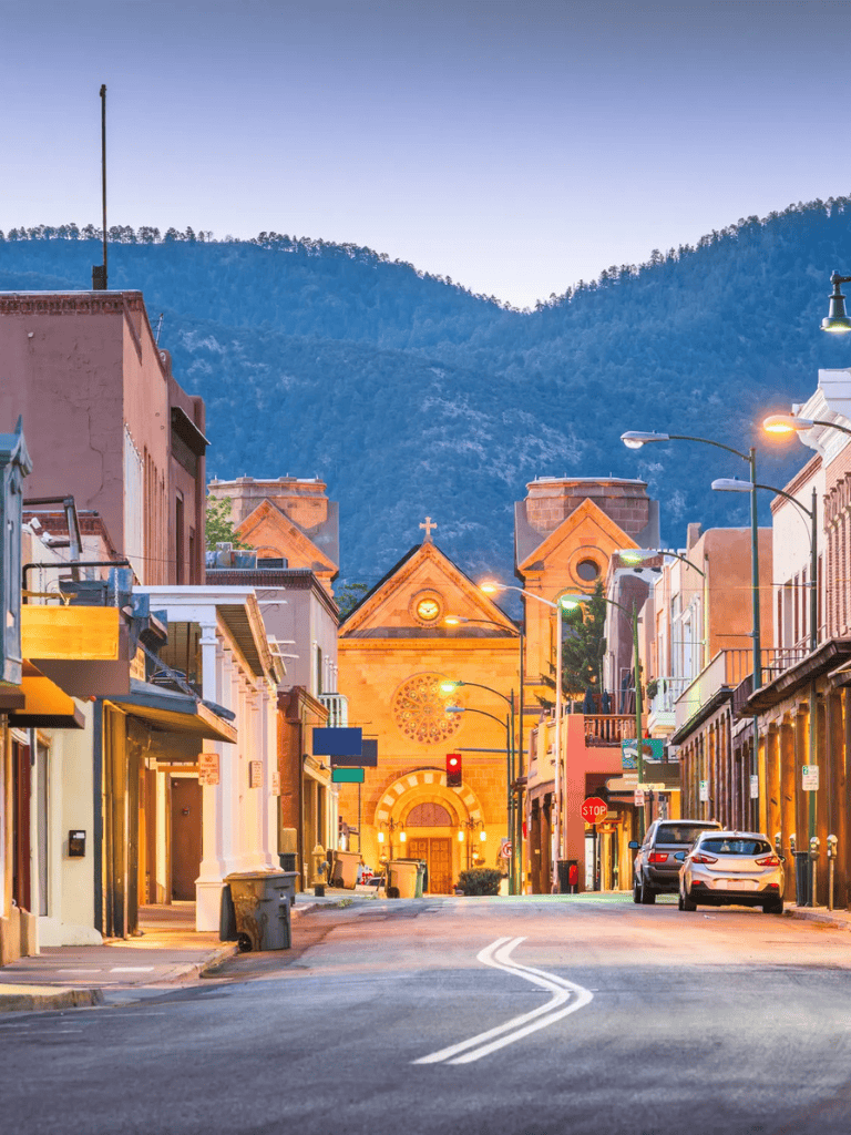 Historic downtown street with colorful buildings and mountain backdrop, perfect for travel and exploration.