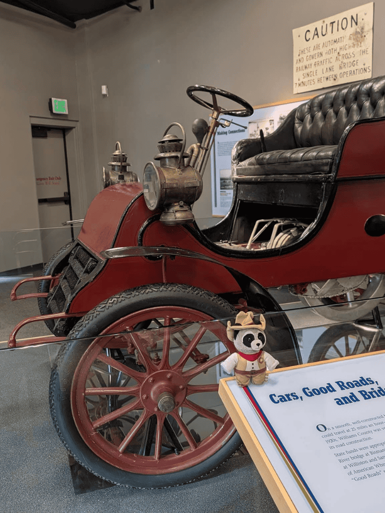 Vintage automobile display at QuestForDirections museum.