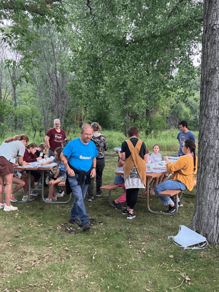 Children outdoor activity at quest for directions event in nature park.
