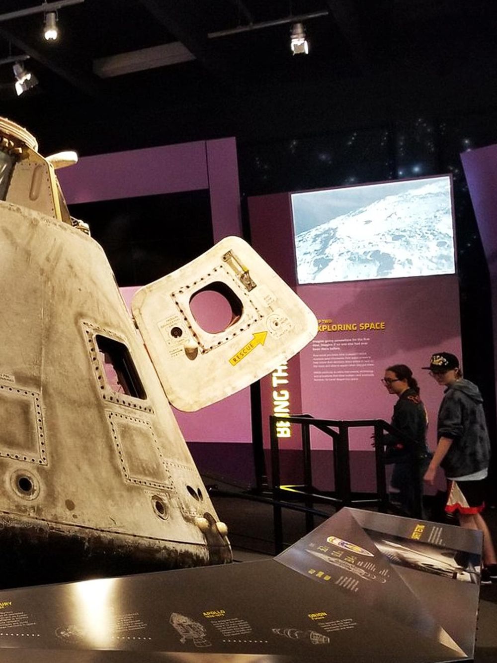 NASA lunar module display at space museum for science education and space exploration.