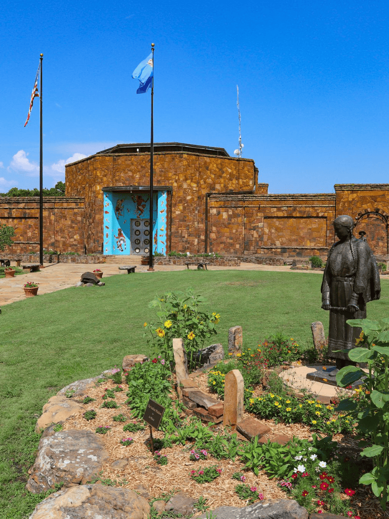 Flagpole and historic fortress on a sunny day at Quest for Directions.