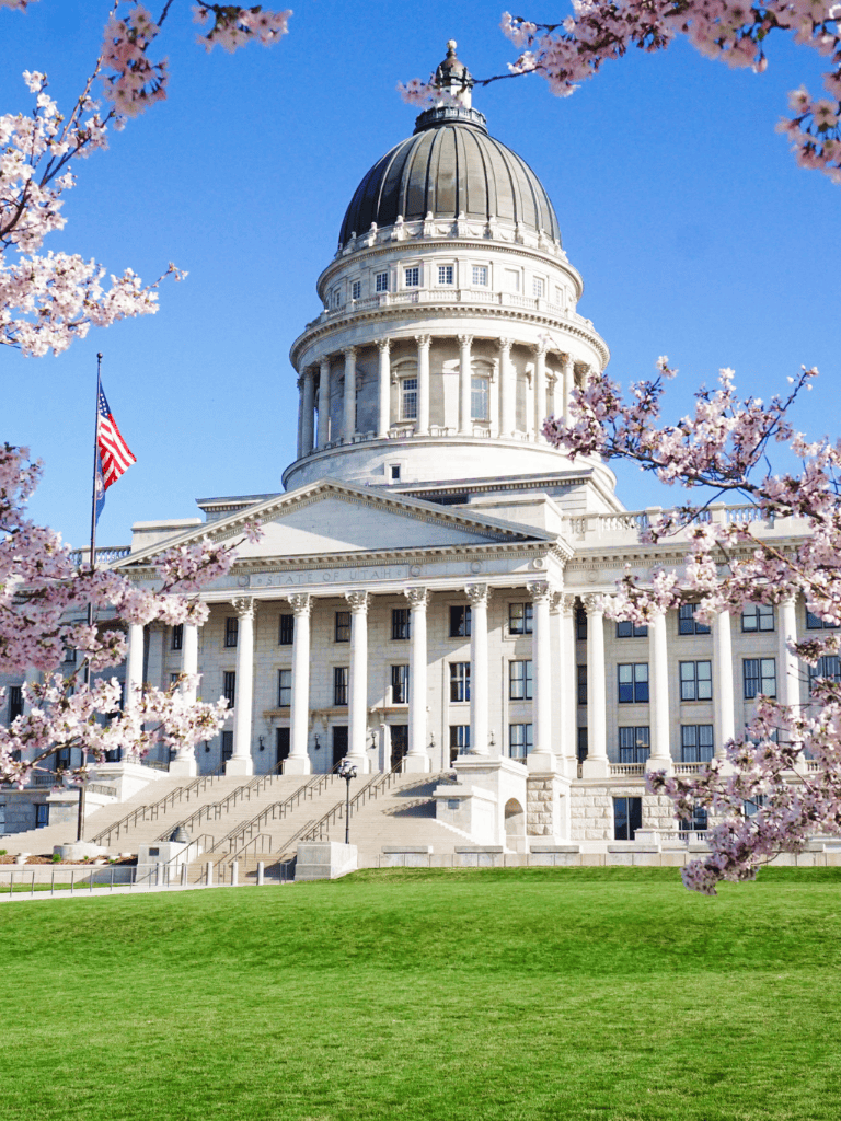 Historic Utah State Capitol building with cherry blossoms in spring, Utah landmarks, government, tourism, local attractions, outdoor views.