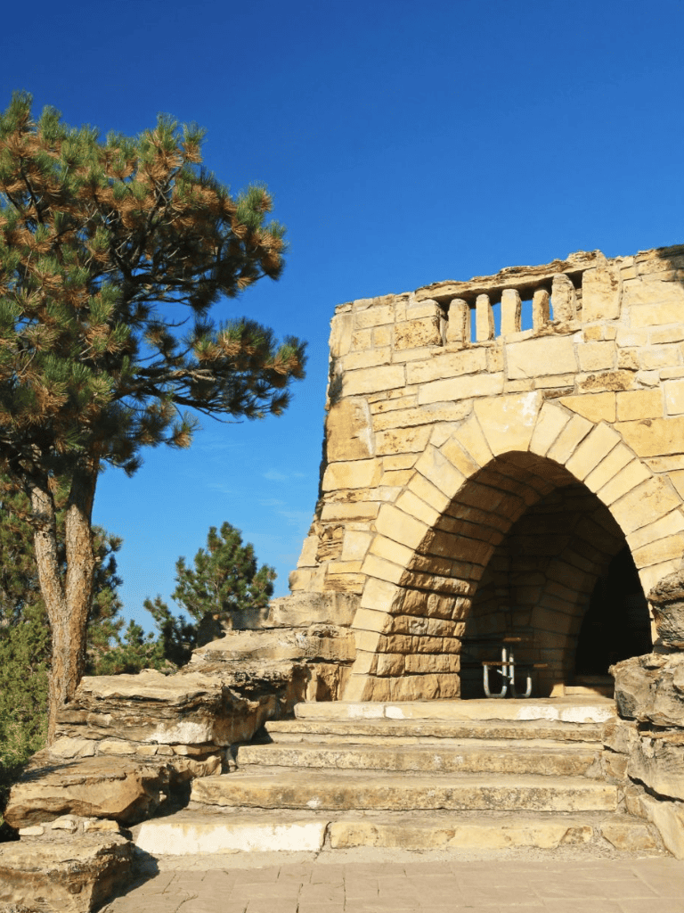 Ancient stone archway and steps at QuestForDirections outdoor historical site.