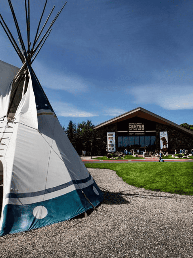 Tipi tent in front of Buffalo Bill Center of the West, Wyoming outdoor adventure destination.