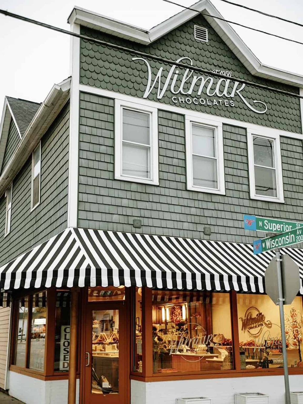 Artisan Chocolates and Unique Sweets on a Charming Corner Storefront in a Neighborhood.