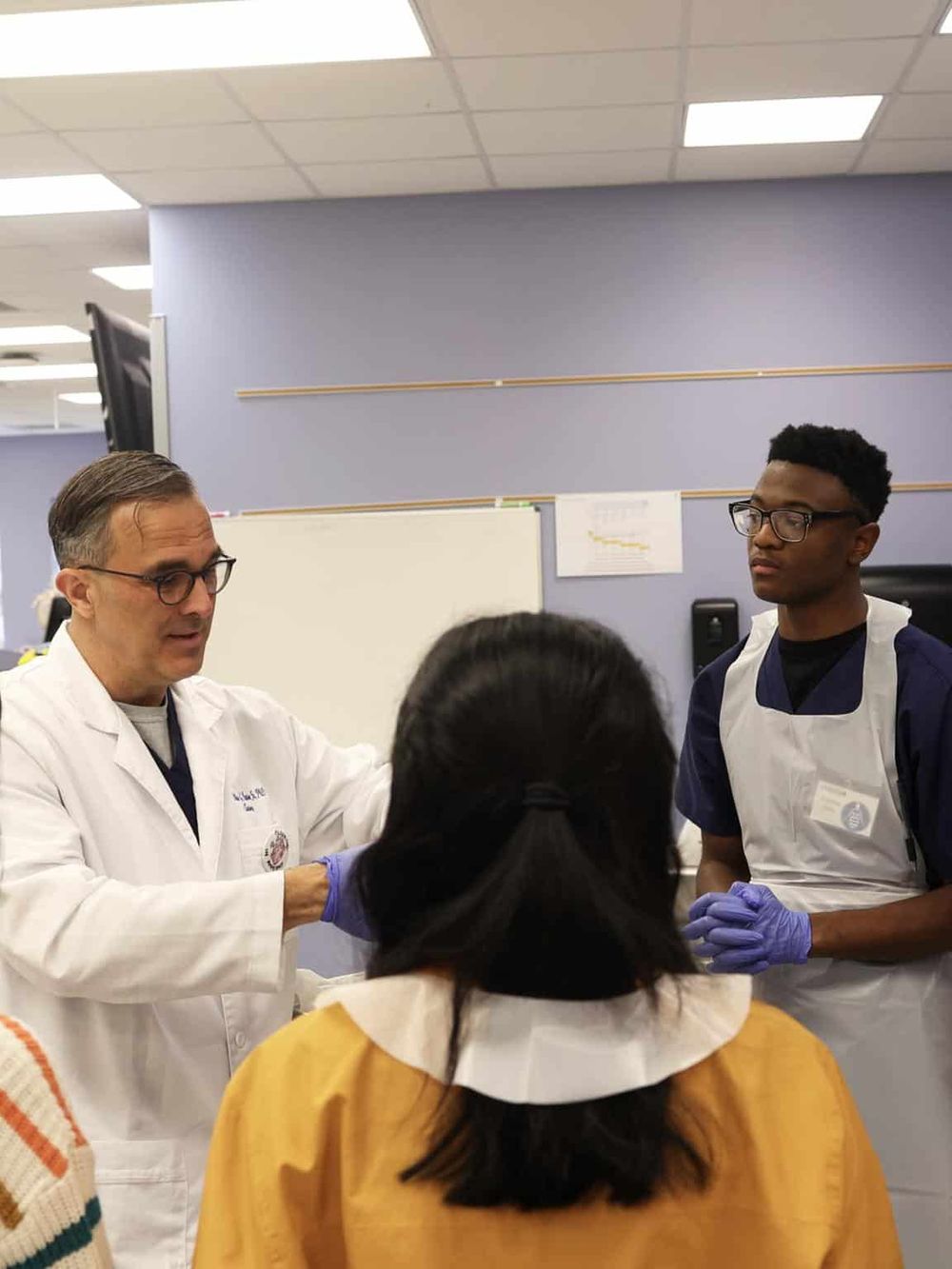 Expert medical team providing health guidance and patient consultation in a healthcare facility.