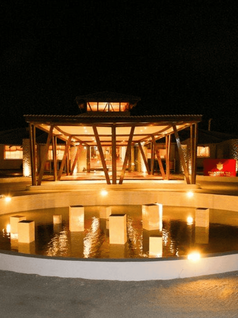 Elegant modern architecture illuminated at night at QuestForDirections.