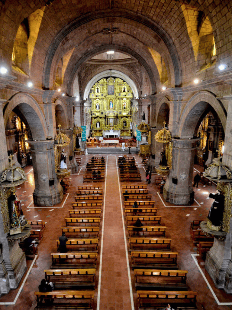 Silent church interior with ornate gold altar and wooden pews, historical architecture, seeking guidance and spiritual connection.