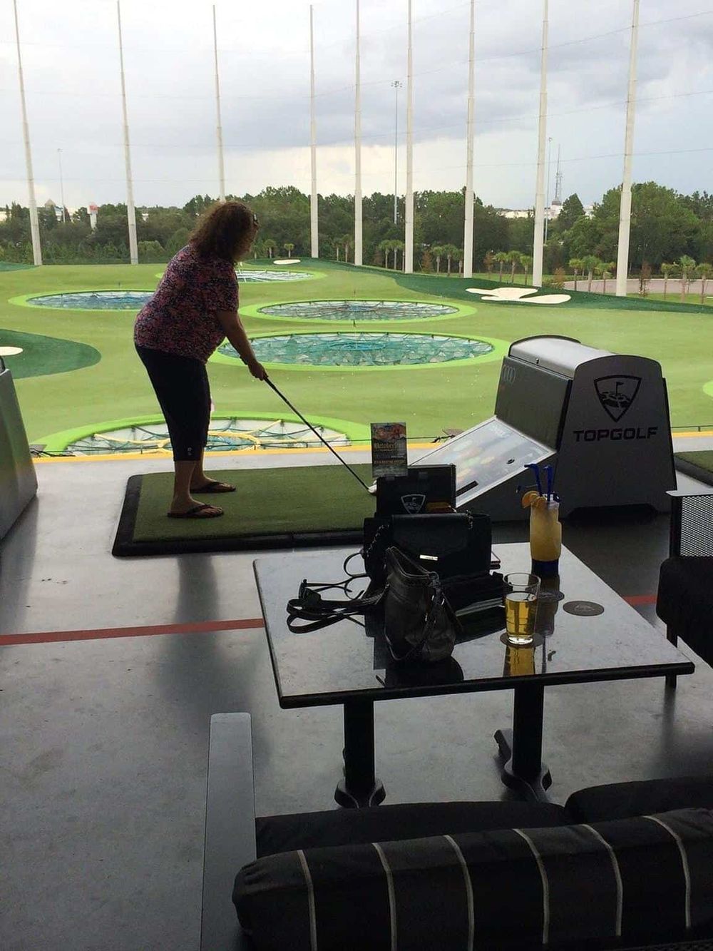 Upscale indoor golf simulation at QuestForDirections, ideal for practicing golf swings all year round.