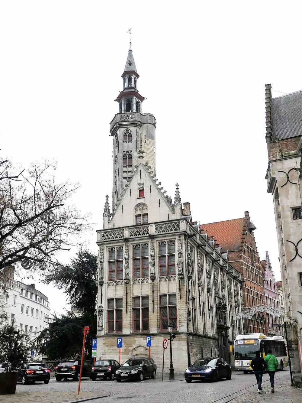 Ancient gothic tower in Brussels, Belgium, showcasing historic architecture and cityscape detail.