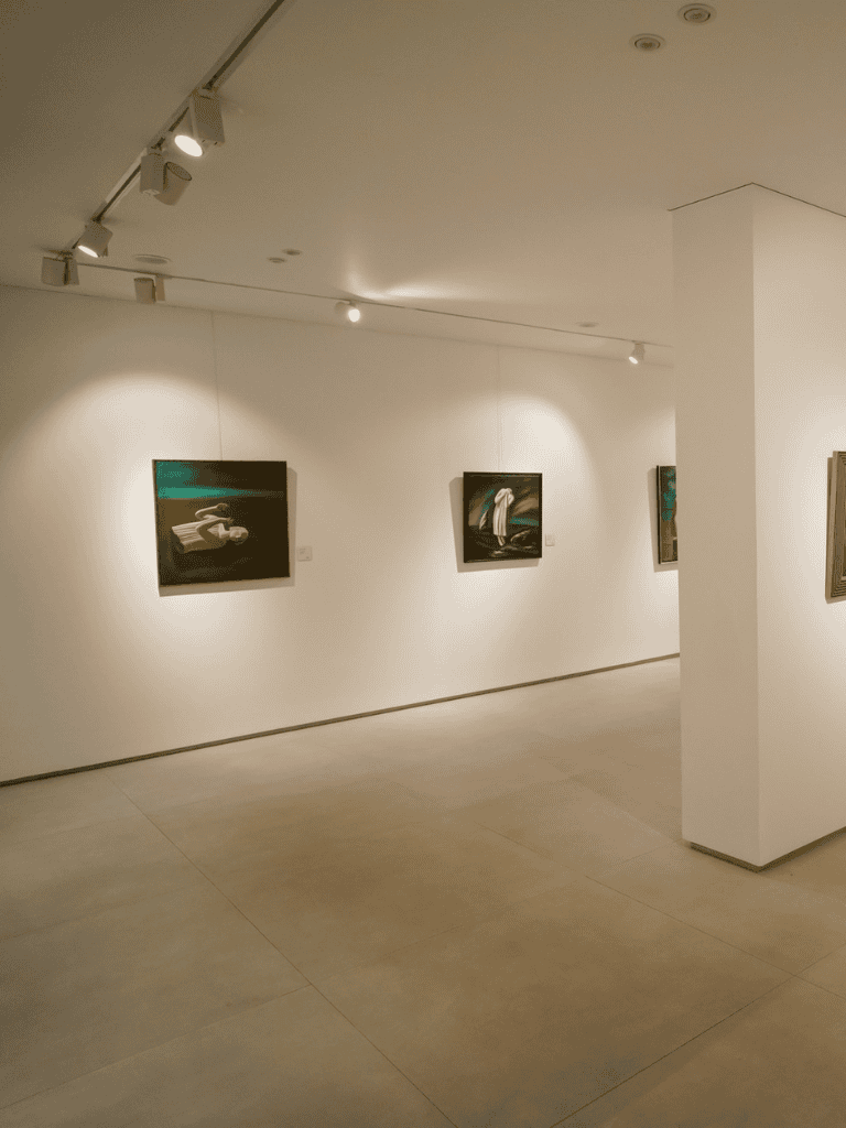 Vibrant art gallery showcasing contemporary paintings in a sleek, modern museum setting.