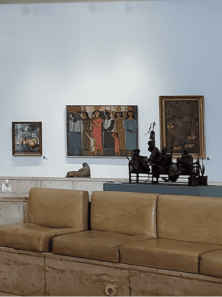 MURAL ARTWORK AND SCULPTURES IN ART GALLERY.